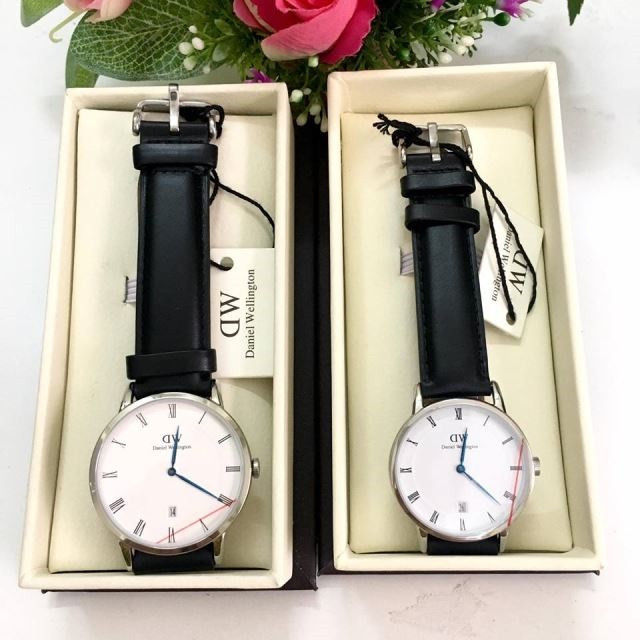 Chi tiết mặt đồng hồ DW cao cấp có lịch ngày và kính khoáng chống xước.