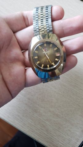mặt đồng hồ đeo tay nam Rado Balboa V màu vàng đồng và dây đeo phối màu