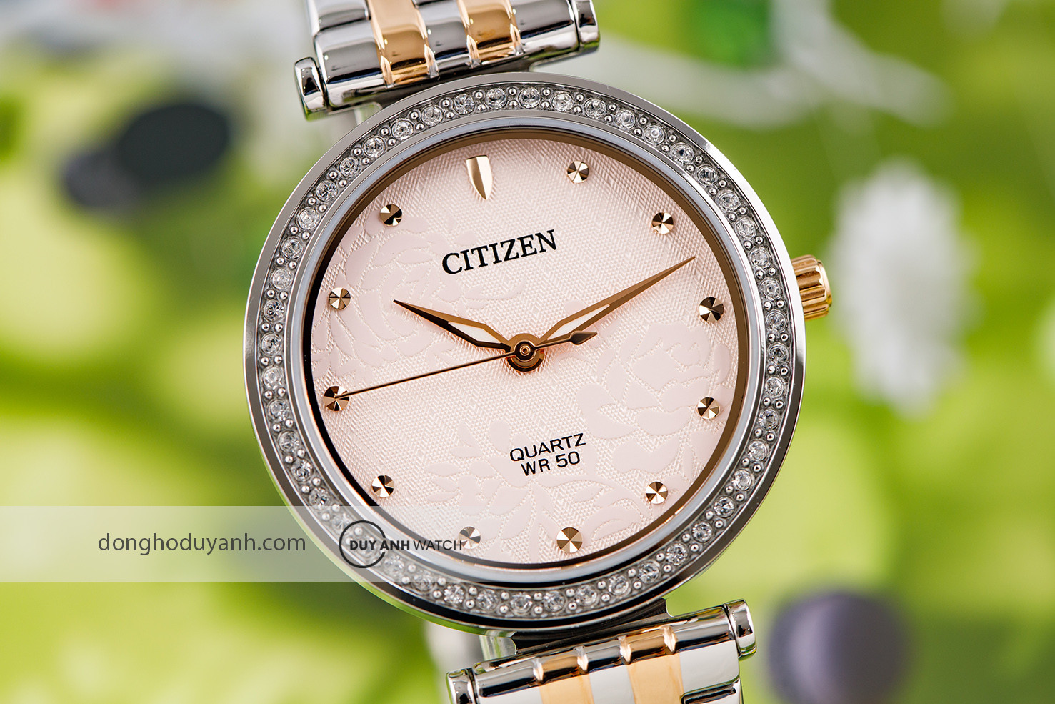 Đồng hồ Citizen ER0218-53X với mặt số hoa hồng và viền đá Swarovski