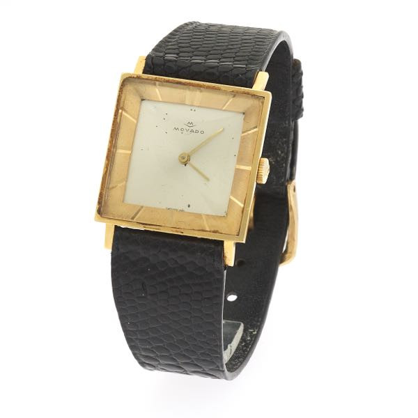 Đồng hồ Movado mặt vuông dây da với thiết kế góc cạnh, nổi bật phong cách.