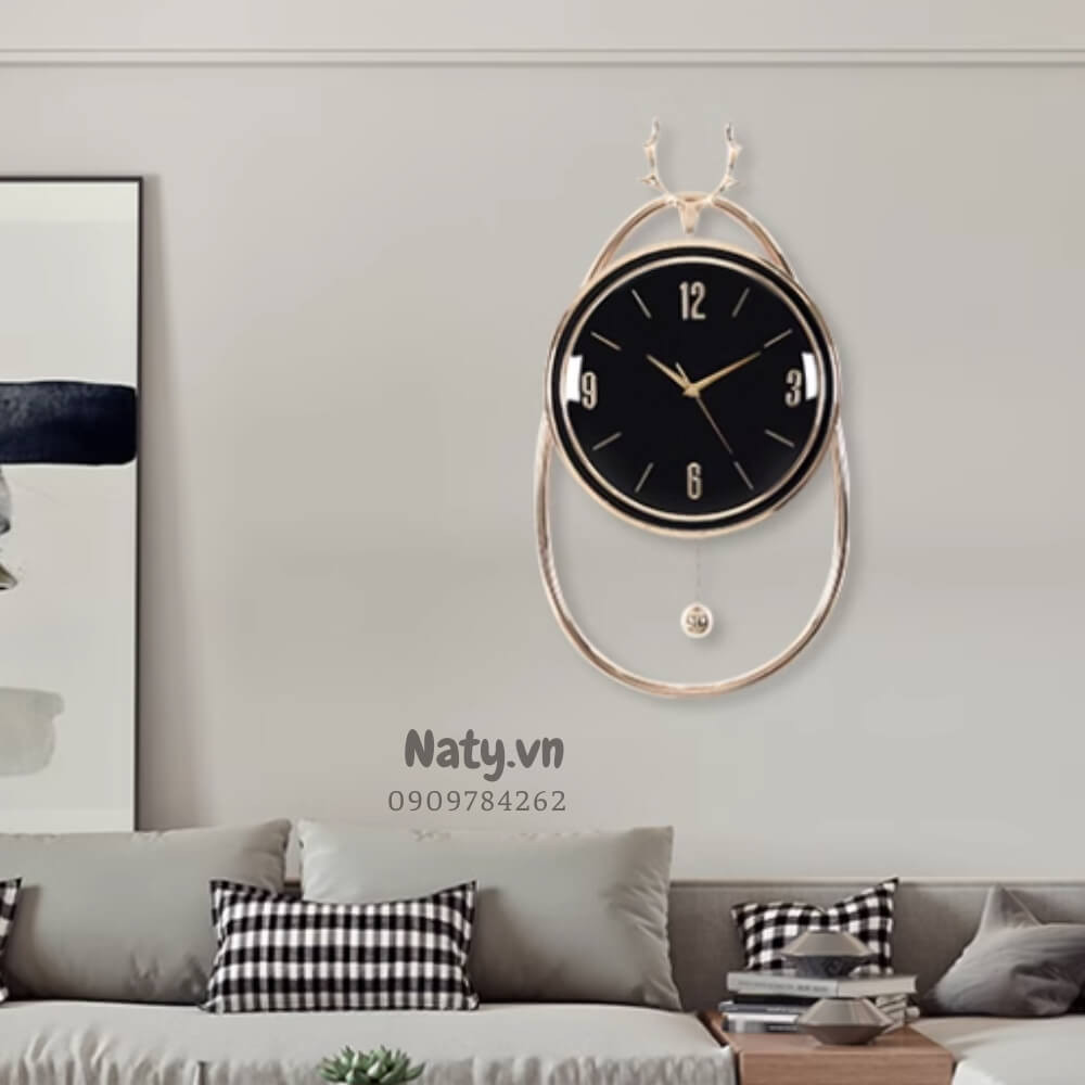 Đồng hồ treo tường hình con công dát vàng cho phòng ngủ