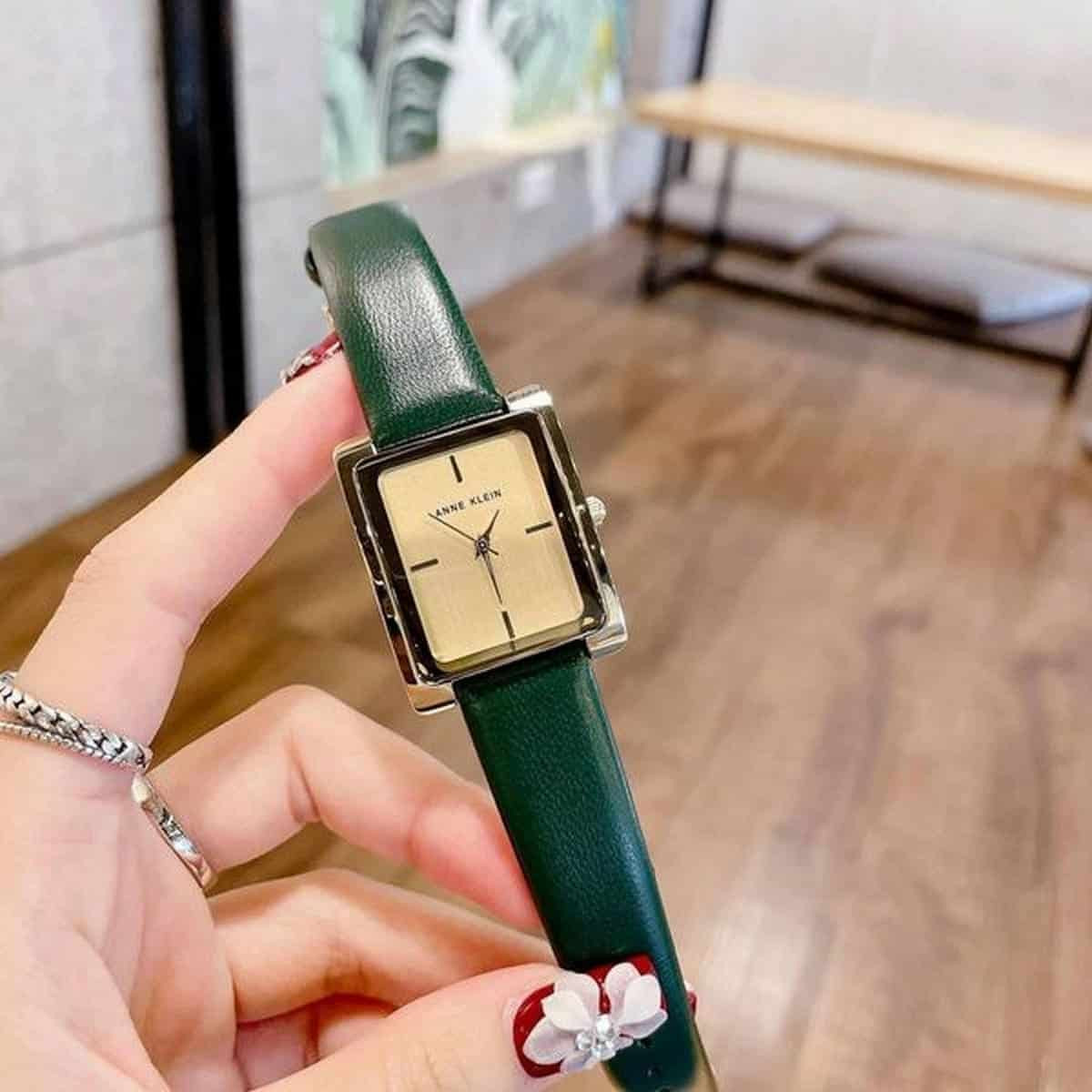 Đồng hồ Anne Klein AK/2706CH mặt vuông màu xanh trên cổ tay nữ