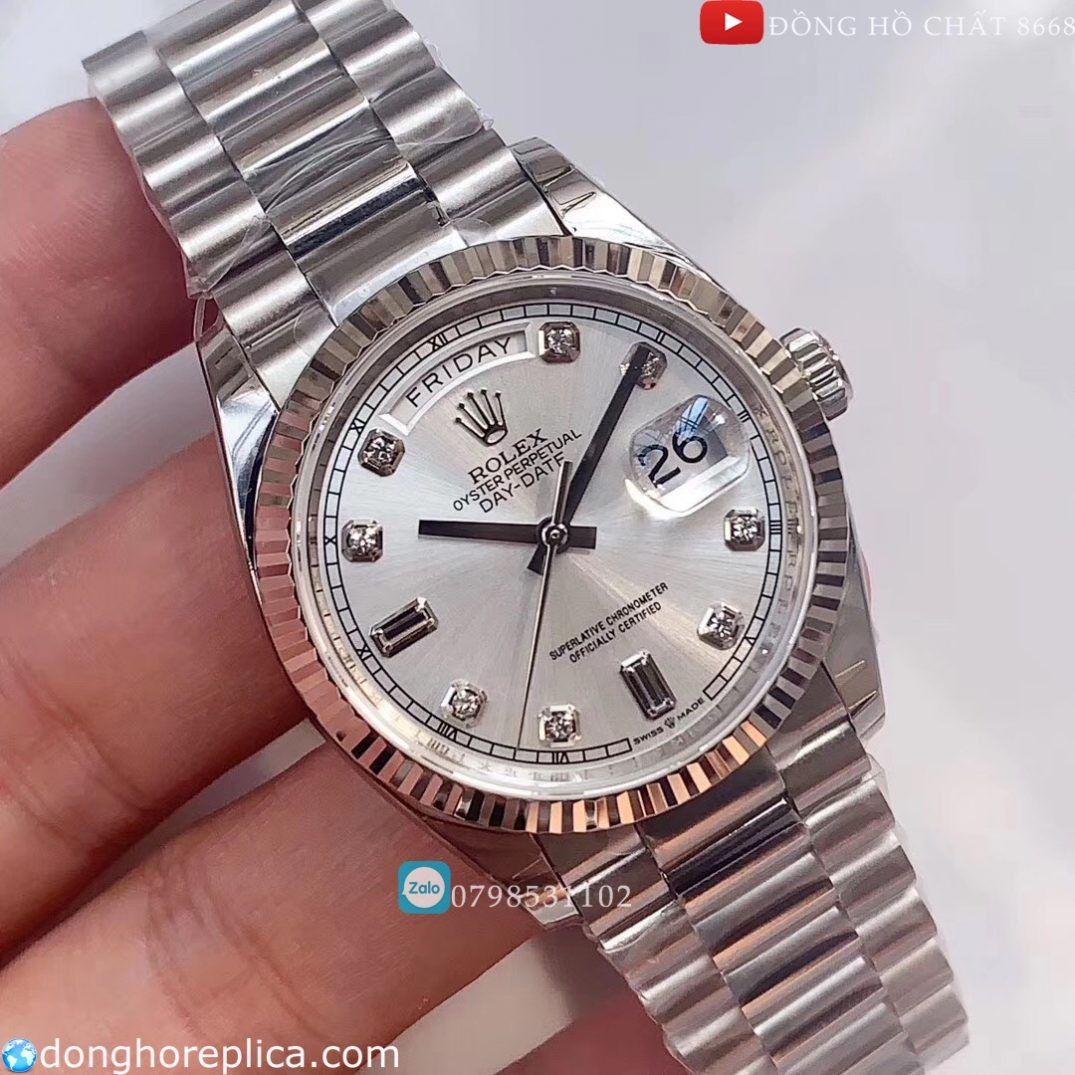 Mặt số đồng hồ Rolex Day-Date 36 với cọc số đá quý và cửa sổ lịch ngày, tác động đến giá