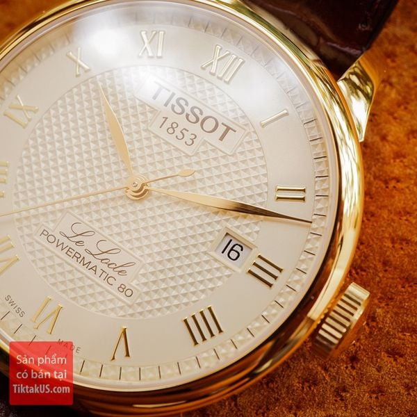 Mặt số đồng hồ Tissot Le Locle với các cọc số La Mã và họa tiết Guilloché