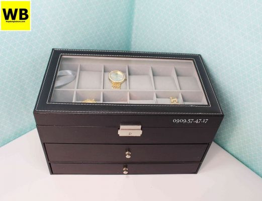 Cận cảnh hộp đựng trang sức đồng hồ với bề mặt da màu đen, đường may tinh xảo