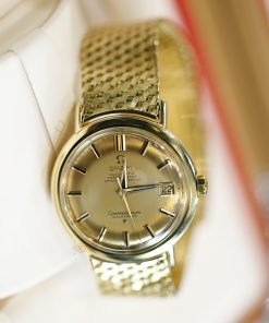 Đồng hồ nam vintage Omega Constellation bát úp mặt vàng, dây vàng 18k cọc đá đen