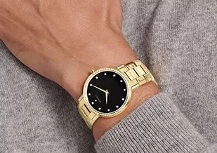 Đồng hồ Movado Faceto nam chính hãng với vỏ và dây kim loại bóng bẩy