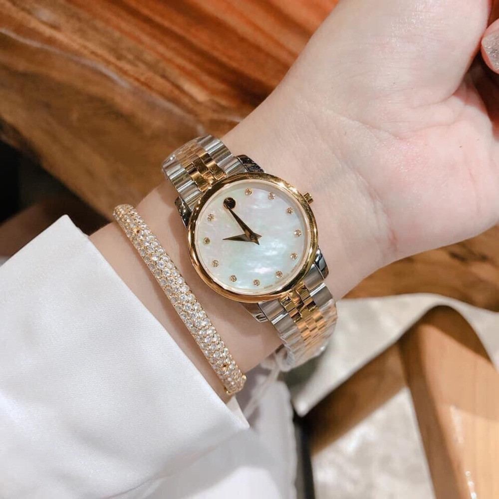 Đồng hồ Movado 0607209 mặt đen với chấm tròn đặc trưng và 11 viên kim cương