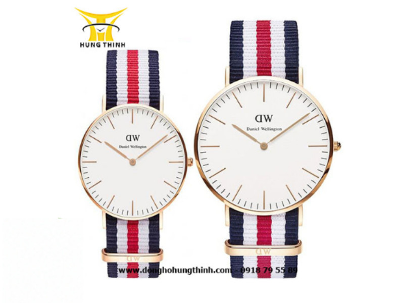 Cặp đồng hồ Daniel Wellington dây vải màu sắc xanh trắng đỏ nổi bật