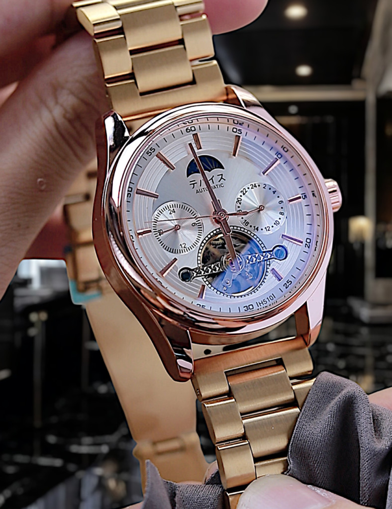 Mặt kính sapphire chống xước và lịch Sun &amp; Moon của đồng hồ mặt vàng dây da
